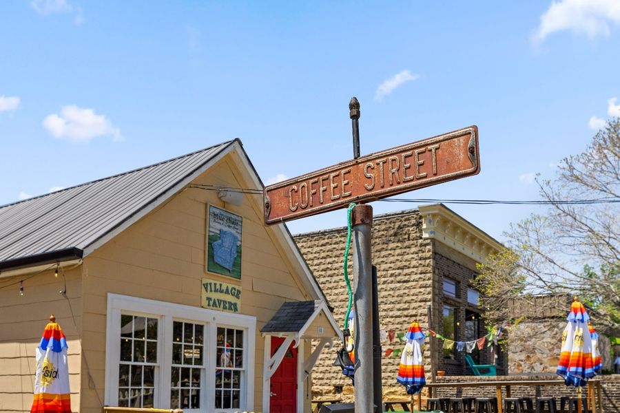 Village street with coffee shop